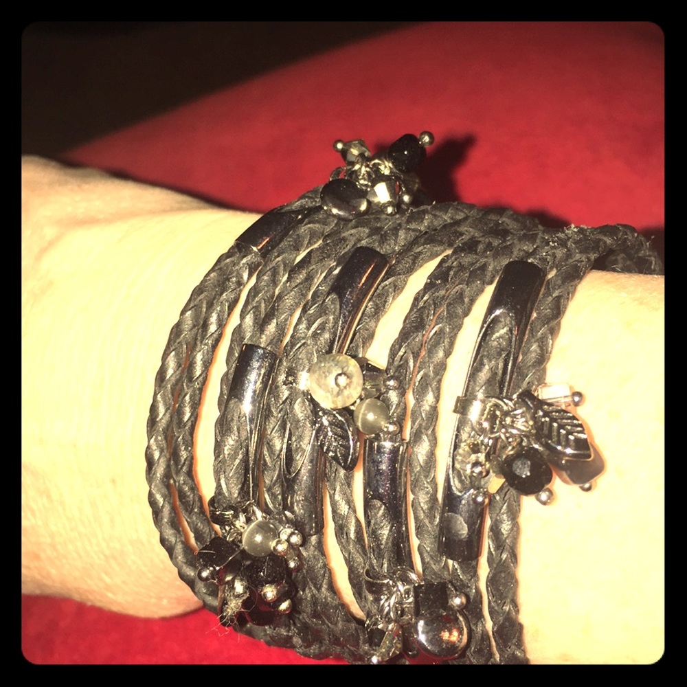 Braided cuff bracelet with charm clusters detail
